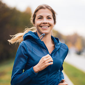 woman happily jogging